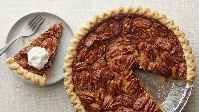 Pecan pie is a pie of pecan nuts mixed with a filling of eggs, butter, and sugar (typically corn syrup). Variations may include white or brown sugar, ...